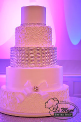 Make your wedding cake a statement with this fondant five tier bling cake.