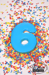 Number 6 iced cookie