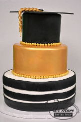 Three tier fondant Graduation cake, black striped bottom tier gold middle tier with a (mortar) graduation hat as a top tier. This cake says &ldquo;job well done!&rdquo;