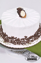 Cannoli cake- vanilla cake filled with cannoli cream and chocolate chips topped with whipped cream.