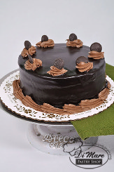 Black Velvet Cake- black velvet cake filled with thin layers of chocolate buttercream.