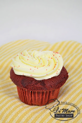 Red velvet cupcakes filled and topped with cream cheese buttercream