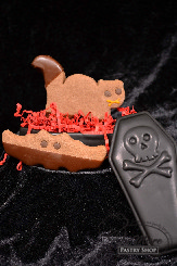 Treat your guests to these creepy critters. Chocolate shortbread cookies dipped in chocolate.