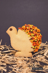 Darling turkey shaped shortbread cookie dipped in chocolate and topped with sprinkles.