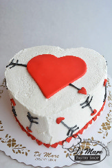 Looks like Cupid shot his arrow into this cake! With a fondant heart on top this buttercream topped cake can be made to order for you and your Cupid Cutie!