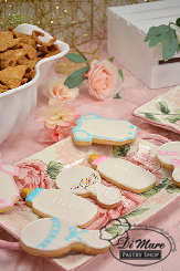 Precious baby shower themed cookies displayed for our 2018 Cake Tasting. Colors and decorations can be altered to your request.