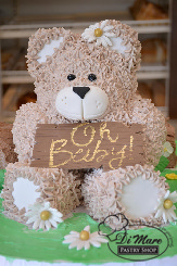 An adorable bear shaped cake perfect for a baby shower or birthday!