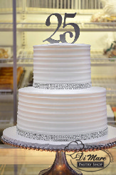 Combed whipped cream and bling ribbon create an elegant decoration to celebrate any occasion, especially a 25 year wedding anniversary.