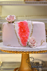 A beautiful fondant cake with crystals inside.