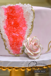 A beautiful fondant cake with crystals inside.