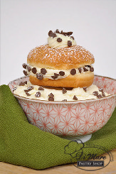 Cannoli donut- a light fluffy donut filled with cannoli cream and chocolate chips.