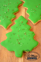 Vibrant green icing tops these Christmas Tree shaped cookies.