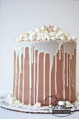 Treat your snow sledder to this giant Hot Chocolate cake! Chocolate buttercream ices the sides and marshmellows top this delightful cake.