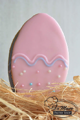 Delicate iced cookies shaped and decorated like Easter Eggs!