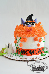 A smash cake decorated as a monster!