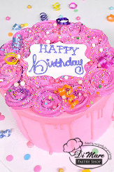 Pink birthday drip cake