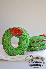 Round butter cookies topped with sprinkles and topped with a bow!