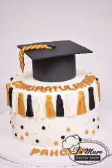 Congratulate your Graduate with this tassel decorated cake topped with a Graduation cap!