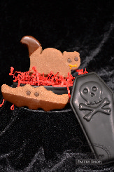 Treat your guests to these creepy critters. Chocolate shortbread cookies dipped in chocolate.