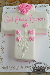 A creative and fun shape for any religious ceremony, this cross shaped cake can be made in fondant (as seen here) or whipped cream.