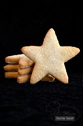 Our butter cookie shaped as a star topped with white sanding sugar.