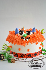 A smash cake decorated as a monster!
