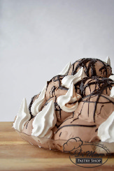 A seasonal classic, Profiteroles! Filled choux pastries covered with chocolate, how delicious!